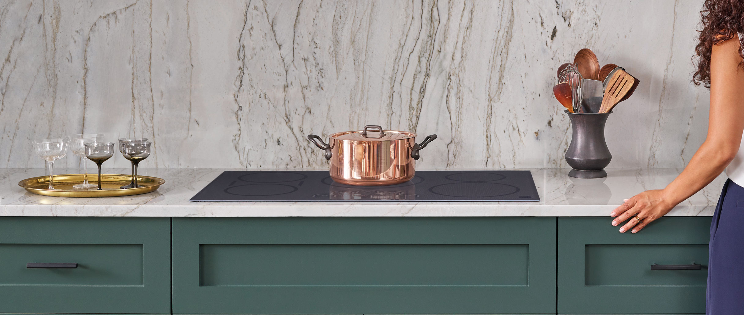 induction cooktop green cabinets