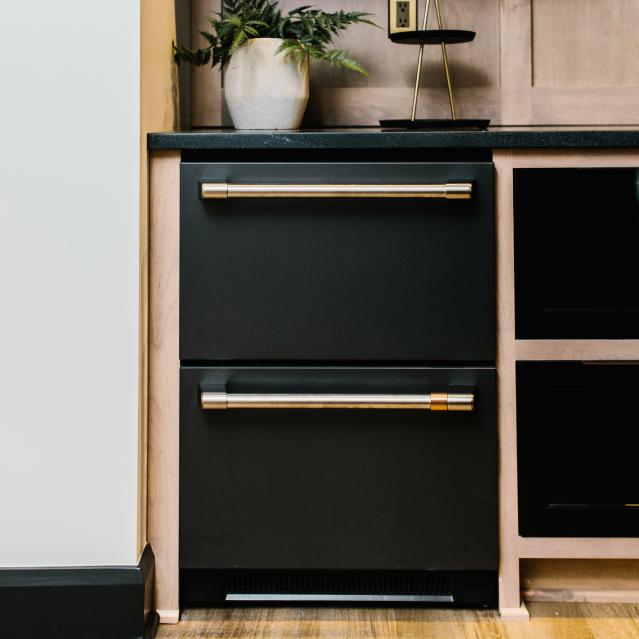 drawer refrigerator in tv room bar